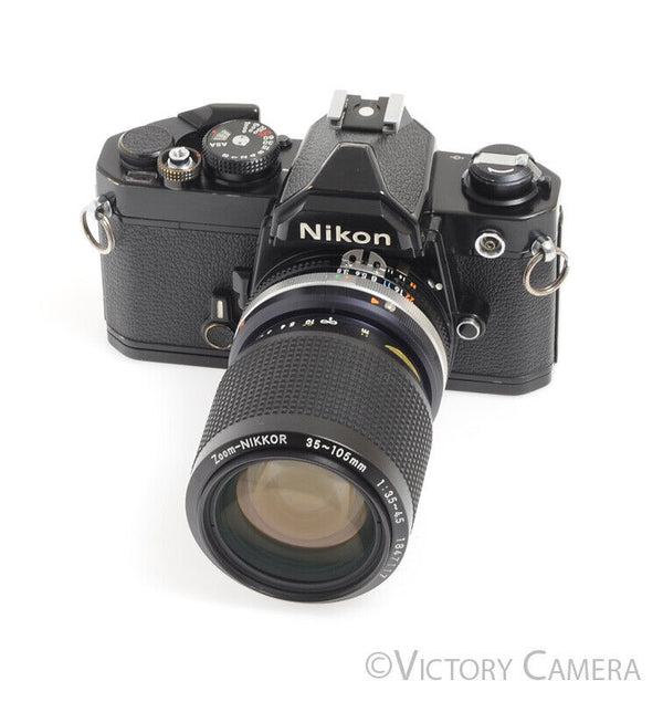 Nikon FM Black 35mm Camera w/ 35-105mm f3.5 Zoom Lens -New 