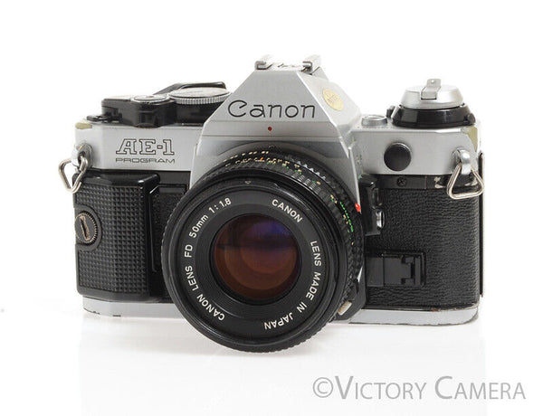 Canon AE-1 Program Chrome 35mm Film SLR Camera w/ 50mm F1