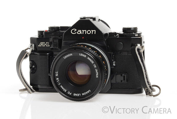 Canon A-1 Black 35mm Camera w/ 50mm F1.8 Lens u0026 Grip -New Seals
