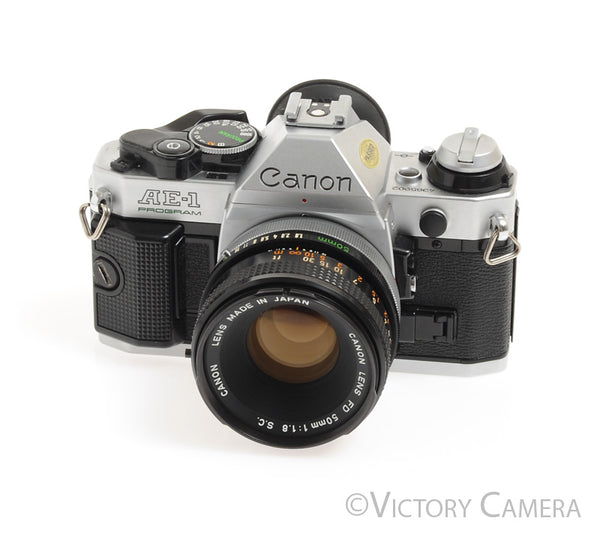 Canon store AE-1 Program Camera With FD 50mm 1.8 Lens