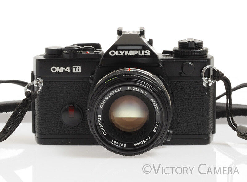 Olympus OM-4Ti OM-4 Ti Rare Black 35mm Camera w/ 50mm f1.8 Lens -Good