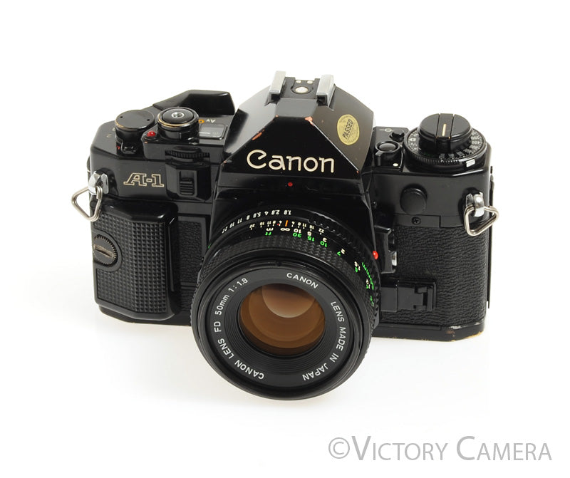 Canon A-1 A1 Black 35mm Film SLR Camera w/ 50mm F1.8 Lens -New Seals- [EXC-] - Victory Camera