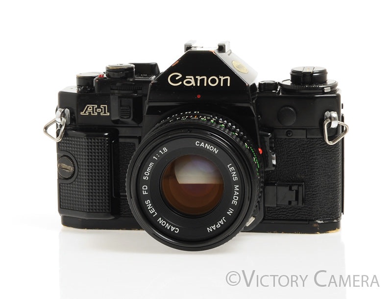 Canon A-1 A1 Black 35mm Film SLR Camera w/ 50mm F1.8 Lens -New Seals- [EXC-] - Victory Camera