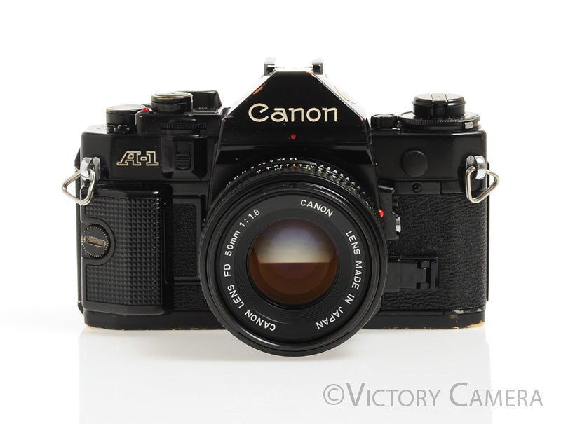 Canon A-1 A1 Black 35mm Film SLR Camera w/ 50mm F1.8 Lens -New Seals- [EXC-] - Victory Camera