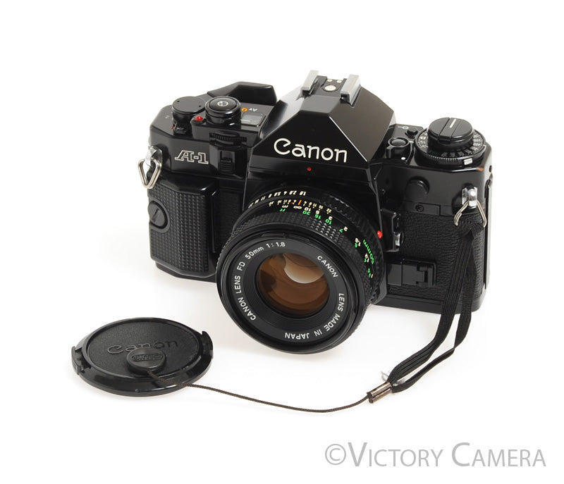 Canon A-1 A1 Black 35mm Film SLR Camera w/ 50mm F1.8 Lens -New Seals,