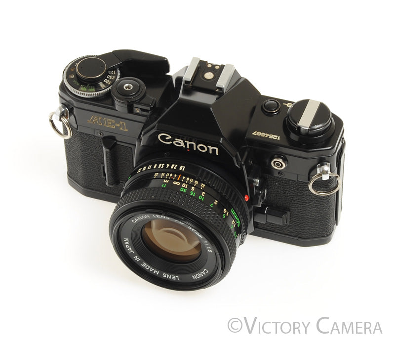 Canon AE-1 35mm Black Film Camera with 50mm f1.8 Lens -New Seals- [EXC] - Victory Camera