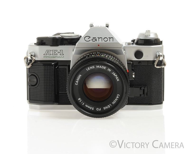 Canon AE-1 Program Chrome 35mm Film Camera w/ 50mm F1.8 Lens -New Seals- [NM] - Victory Camera