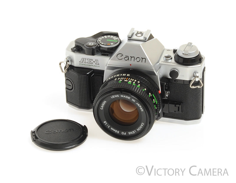 Canon AE-1 Program Chrome 35mm Film Camera w/ 50mm F1.8 Lens -New Seals- [NM] - Victory Camera