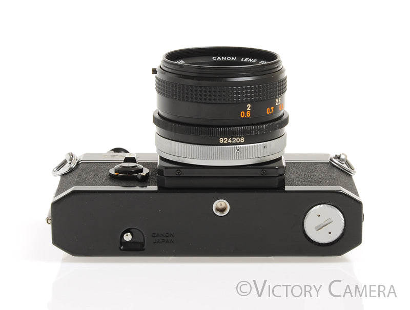 Canon F1 F-1 Black 35mm Camera Body w/ 50mm f1.8 Lens -New Seals- [Near Mint] - Victory Camera