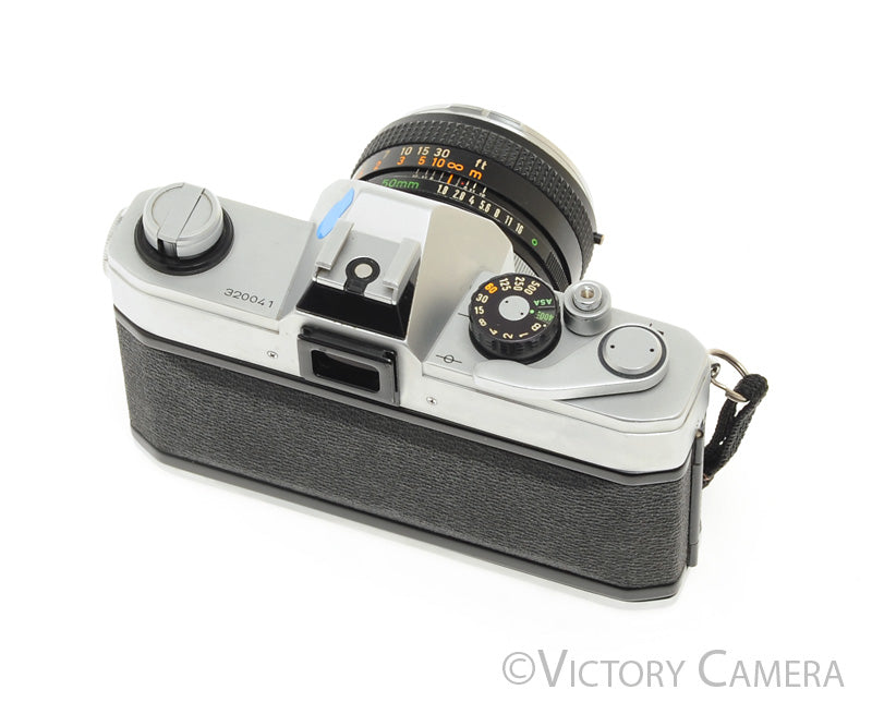 Canon TX Chrome 35mm SLR Camera w/ 50mm f1.8 Lens -New Seals- [EXC] - Victory Camera