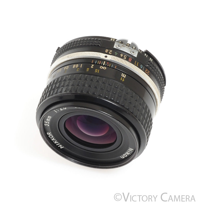 Nikon Nikkor 35mm F2.8 AI Wide Angle Prime Lens -Clean w/ Shade- - Victory Camera